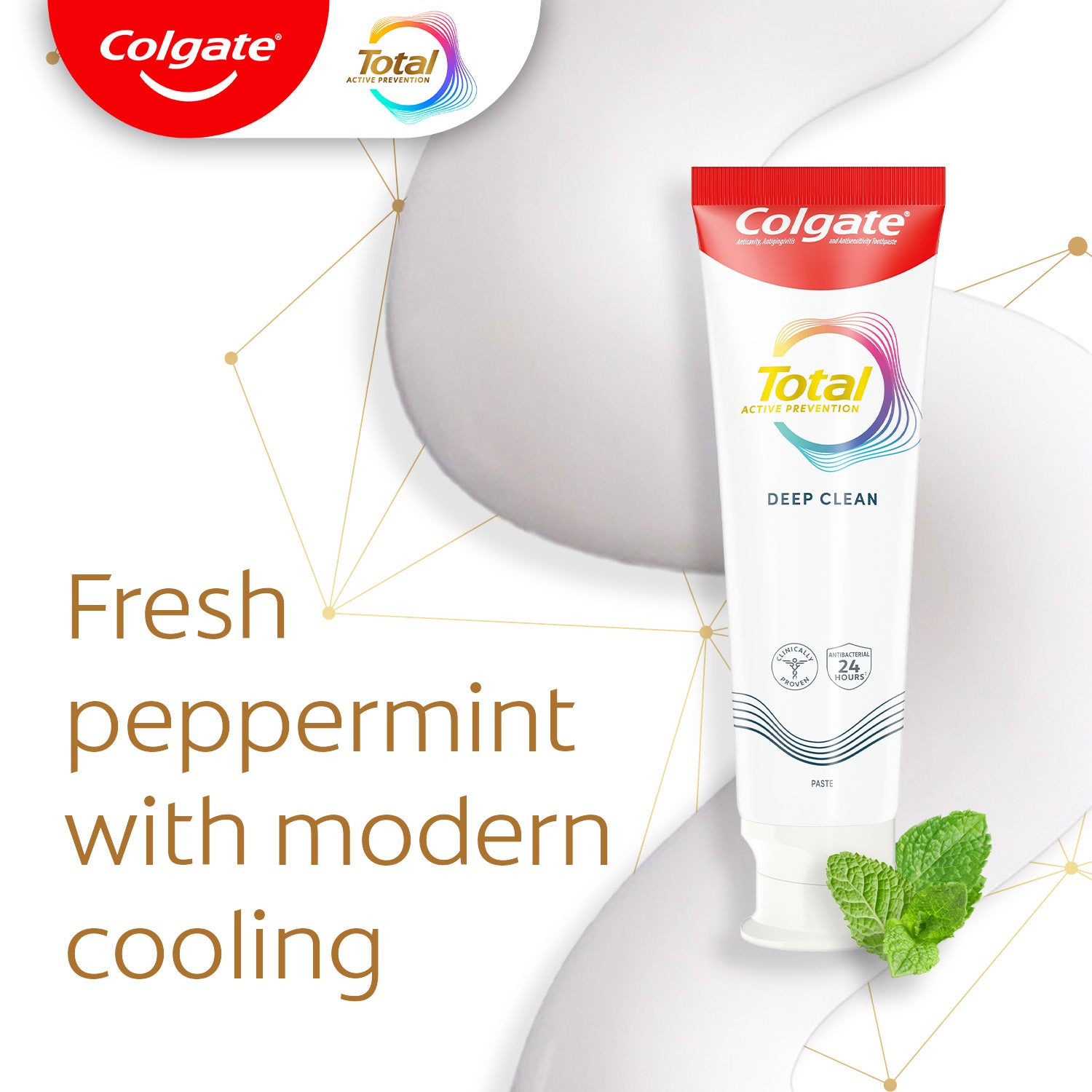 A tube of Colgate Total Deep Clean toothpaste next to mint leaves. In text: Fresh peppermint with modern cooling