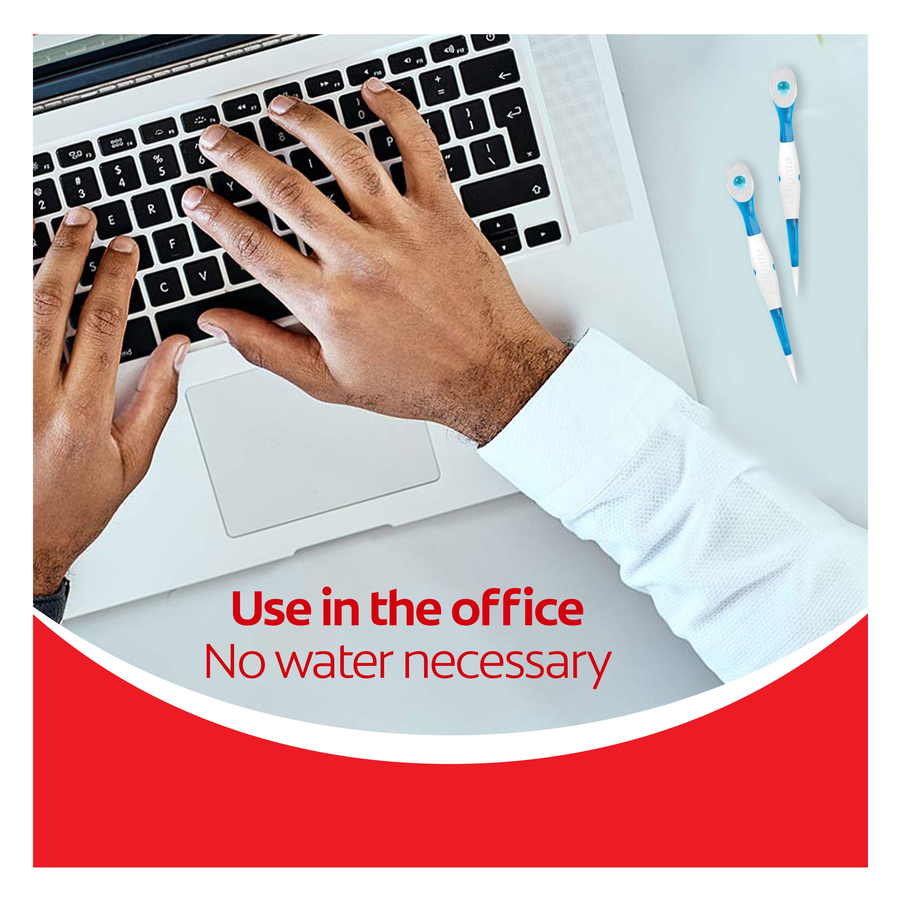 A man typing on a laptop next to two Colgate Max Fresh Wisp Disposable Mini Travel Toothbrushes. In text: Use in the office. No water necessary.
