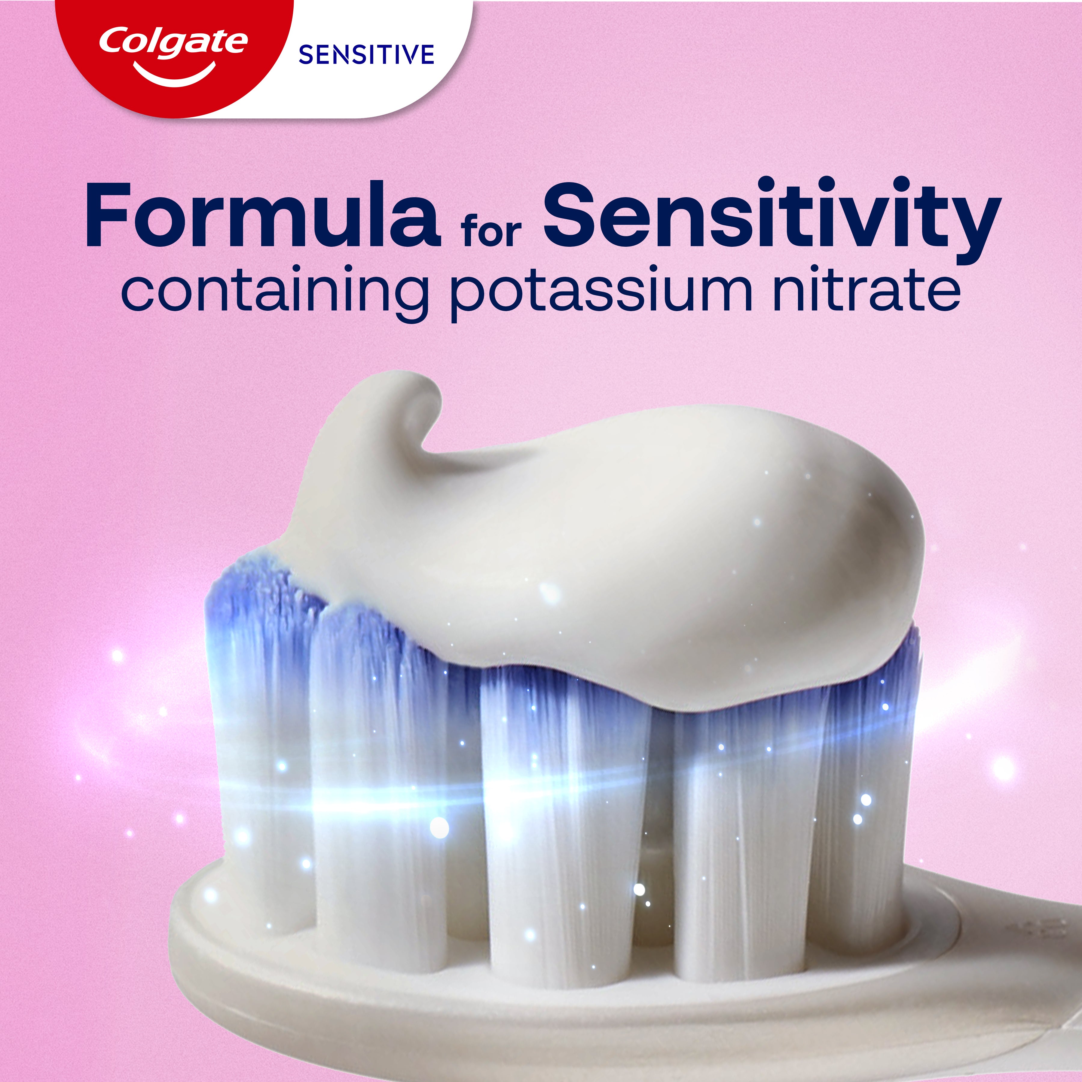 A close-up of Colgate Sensitive Complete Protection Toothpaste on a toothbrush head. In text: Formula for sensitivity containing potassium nitrate.